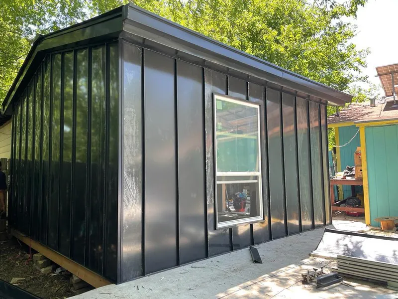 Black standing seam metal wall panels for Roof Inspection in Riverside